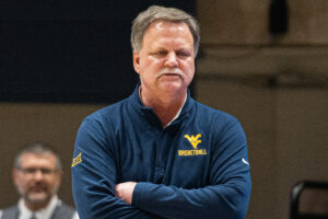 WVU women's basketball coach Mike Carey retires